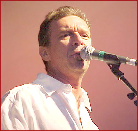 Zachary Richard singing onstage at the Festival Acadien