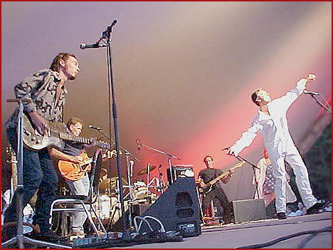 Zachary Richard and band onstage at the Festival Acadien