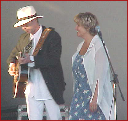 Zachary Richard playing guitar at the Festival Acadien